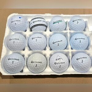 12 Taylormade TP5 white golf balls. Very good to excellent condition!